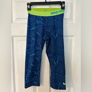 NIKE Pro capri legging, with cobalt blue and turquoise print. Size small.